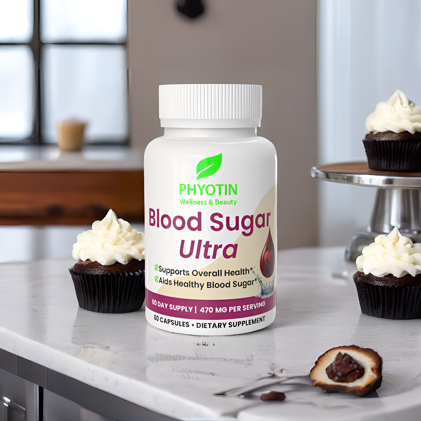 Supplement bottle labeled 'Blood Sugar Ultra' by Phyotin on a kitchen counter with cupcakes in the background.