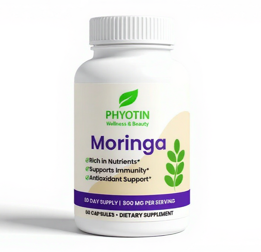 Moringa superfood powder in white bowl with fresh moringa leaves - natural immune system booster
