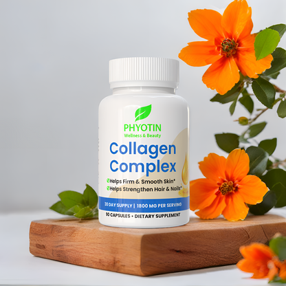 Phyotin Collagen Complex supplement bottle with orange flowers on a wooden block